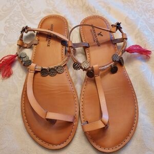 American Eagle Outfitters Tan Sandals with Red Tassels